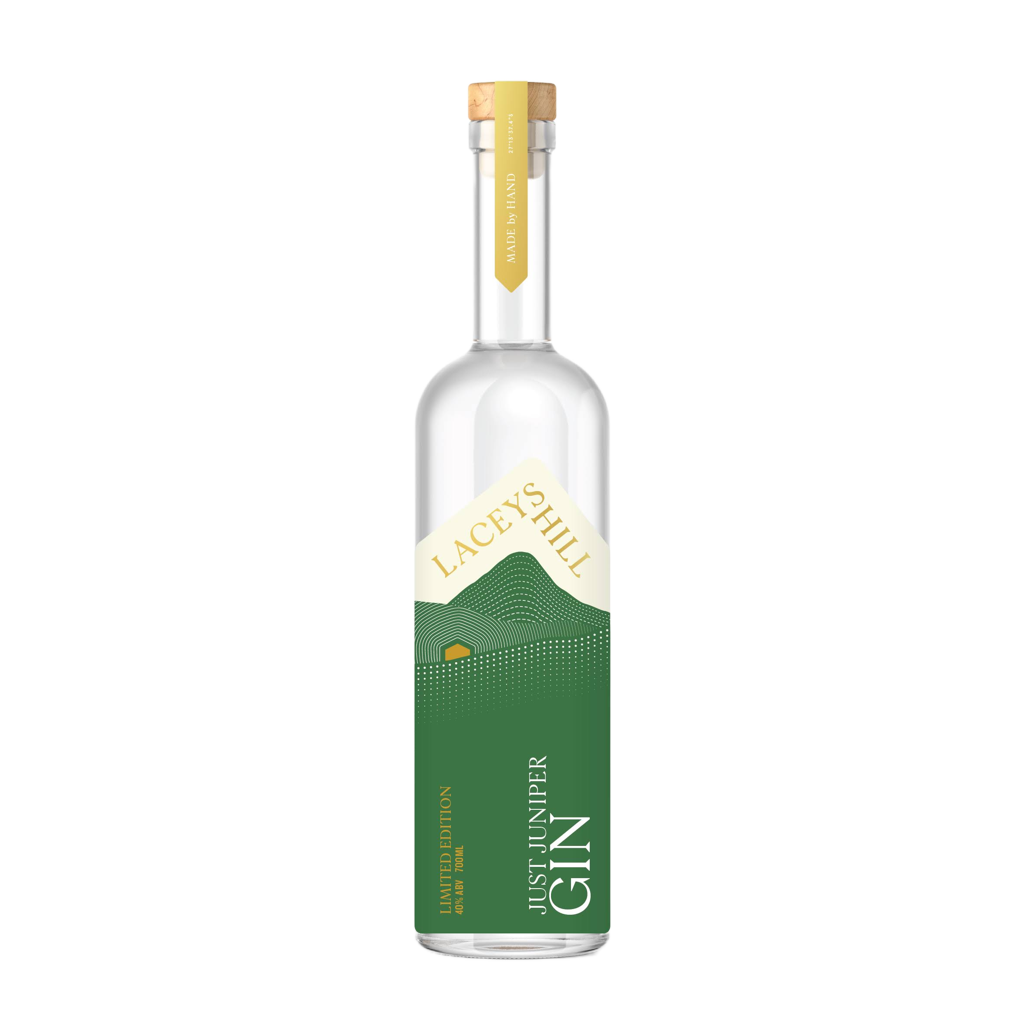 A clear glass bottle of Just Juniper Gin with a label that includes the brand name 'Laceys Hill' and the product name 'Just Gin'. The cap of the bottle is gold-colored.
