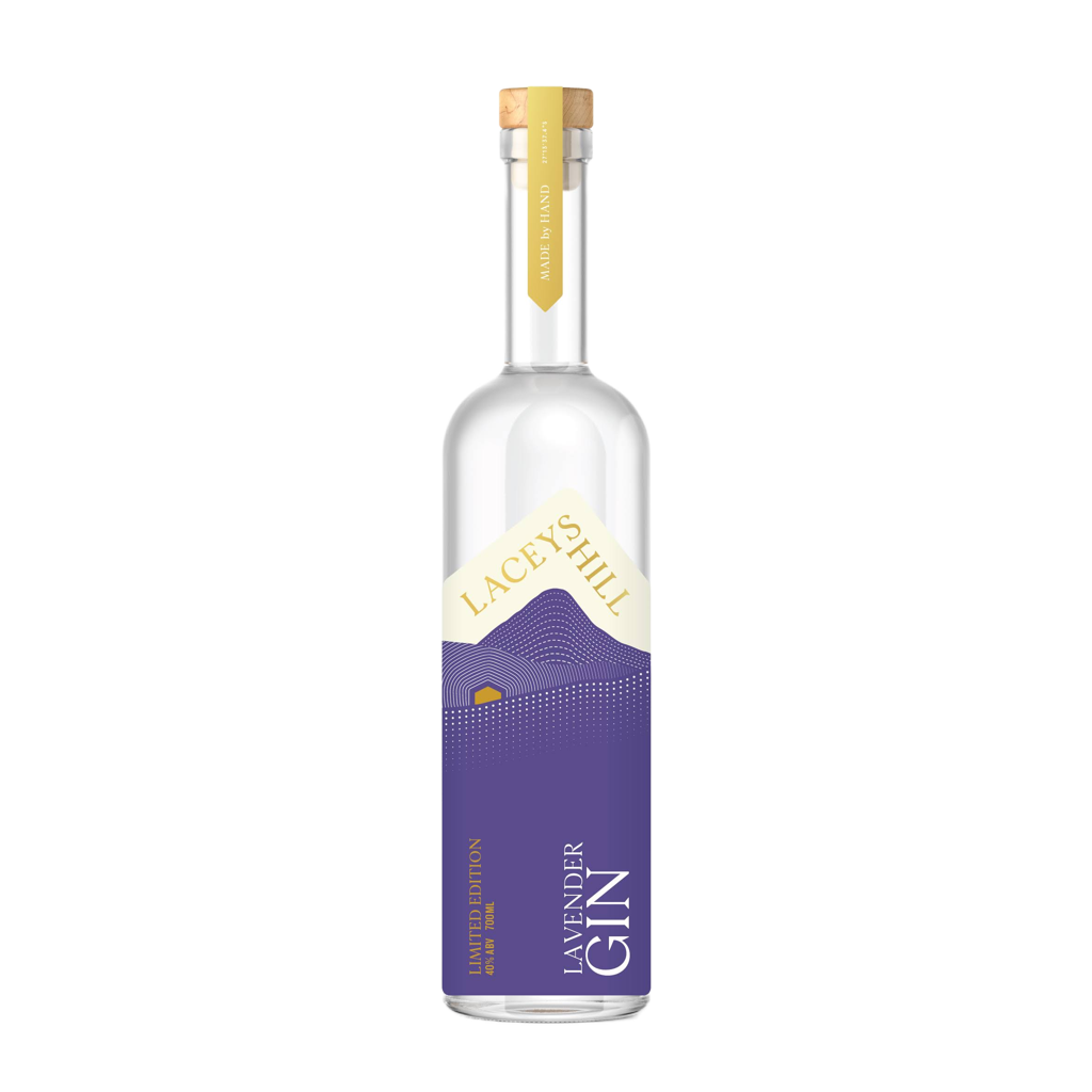 A bottle of Laceys Hill Lavender Gin with a purple label, clear glass, and a golden cap.