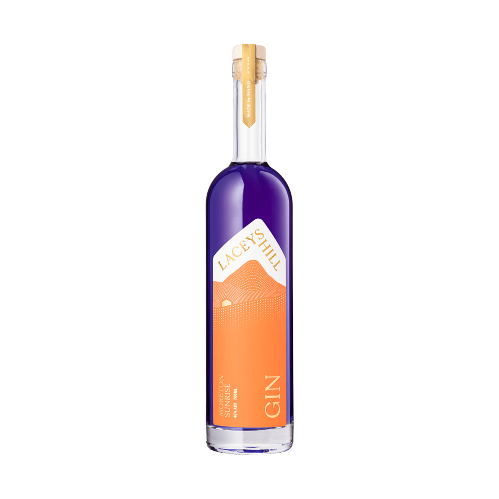 A bottle of Moreton Sunrise Gin with a purple label, orange detailing, and a clear glass texture.