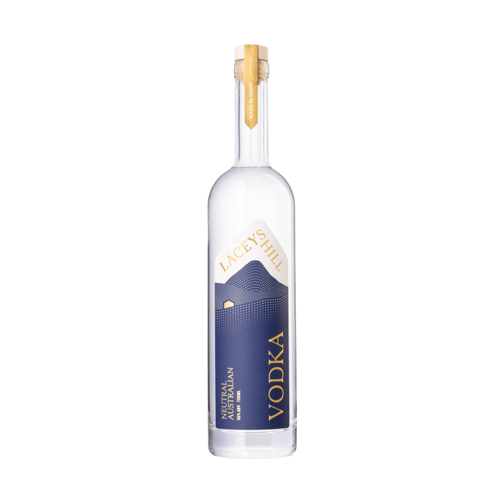 A bottle of Neutral Australian Vodka with a white label and blue text, including a depiction of a mountain range.
